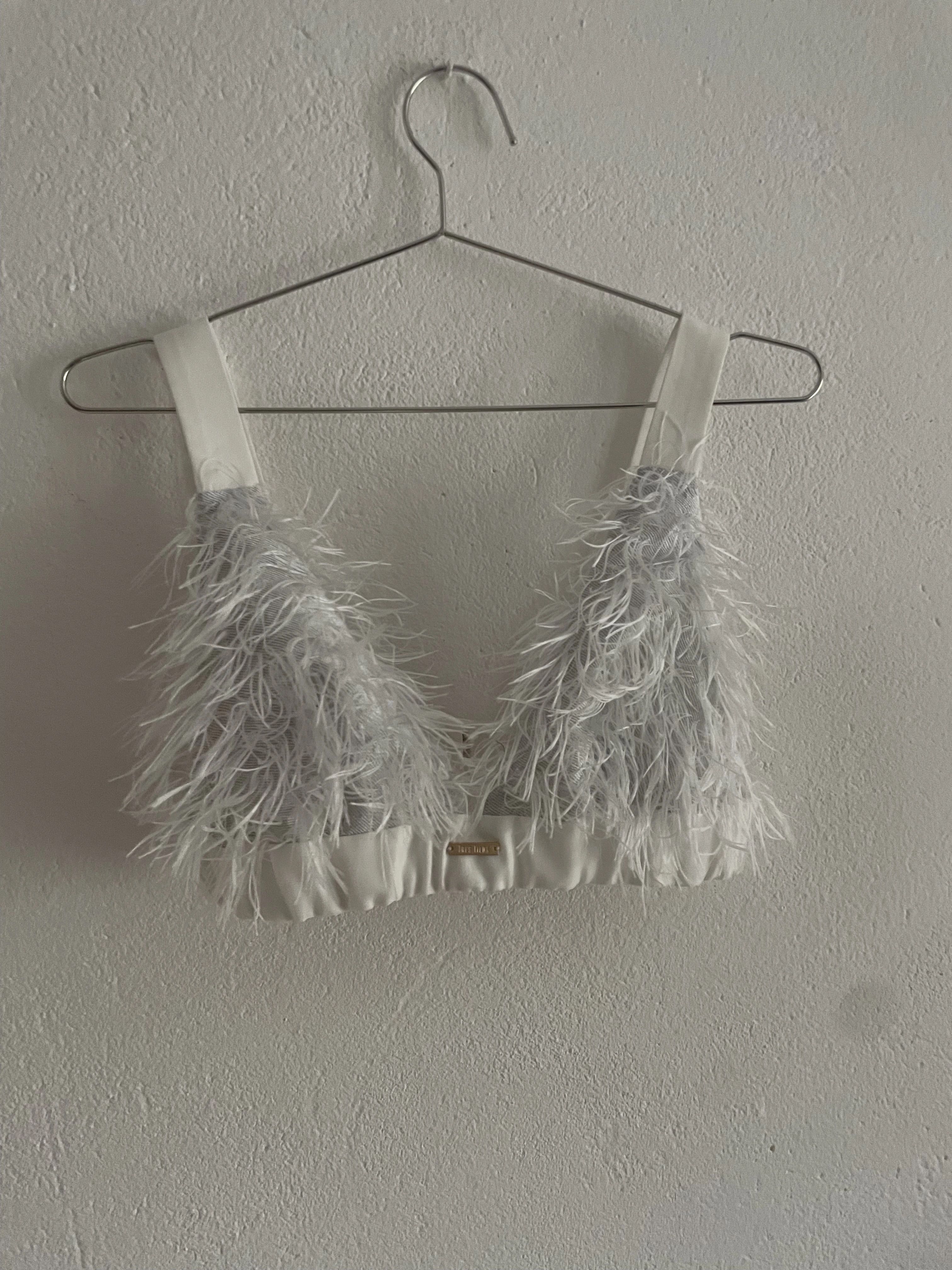 Feathered top product photo — input