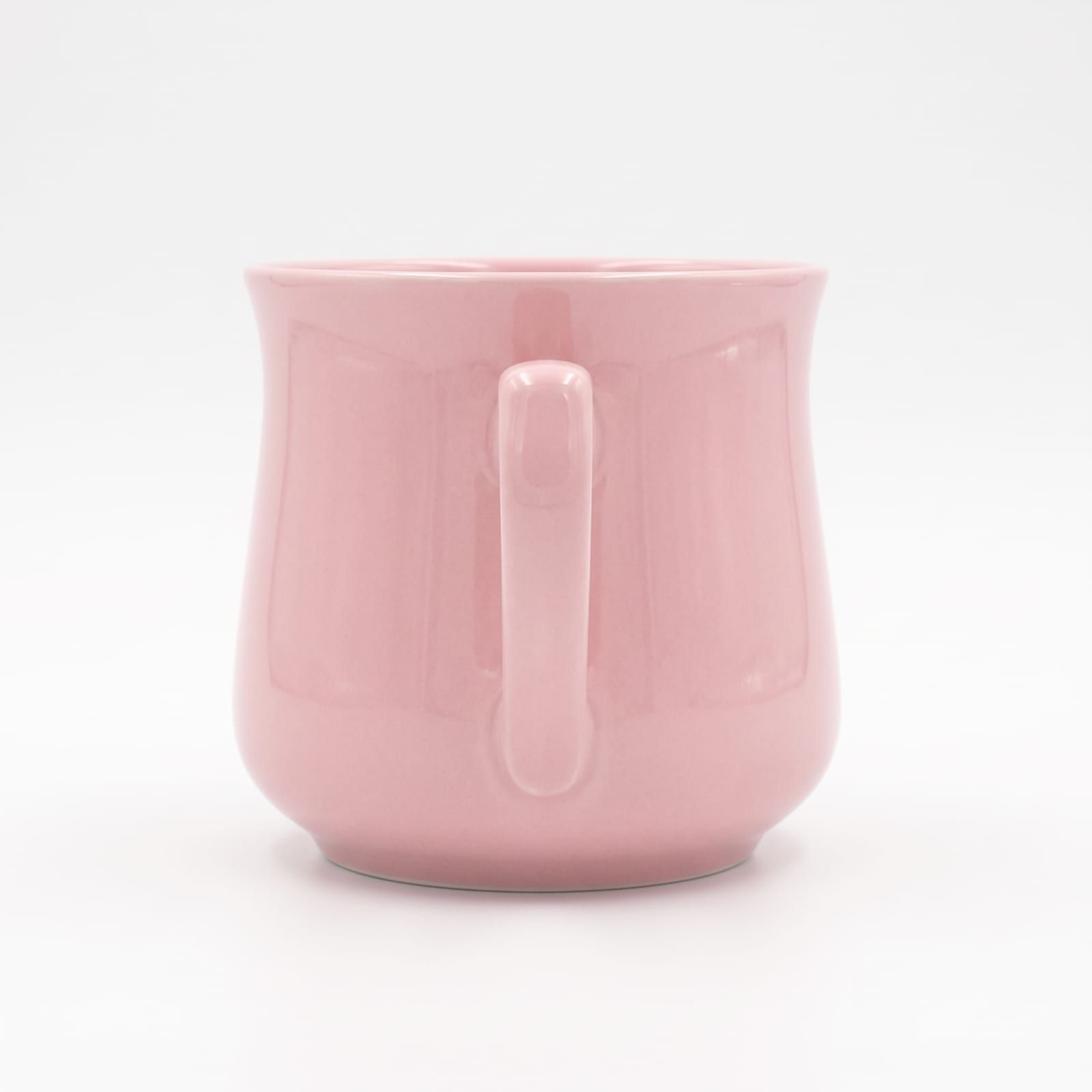 The pink mug as a packshot turned so the handle faces the camera