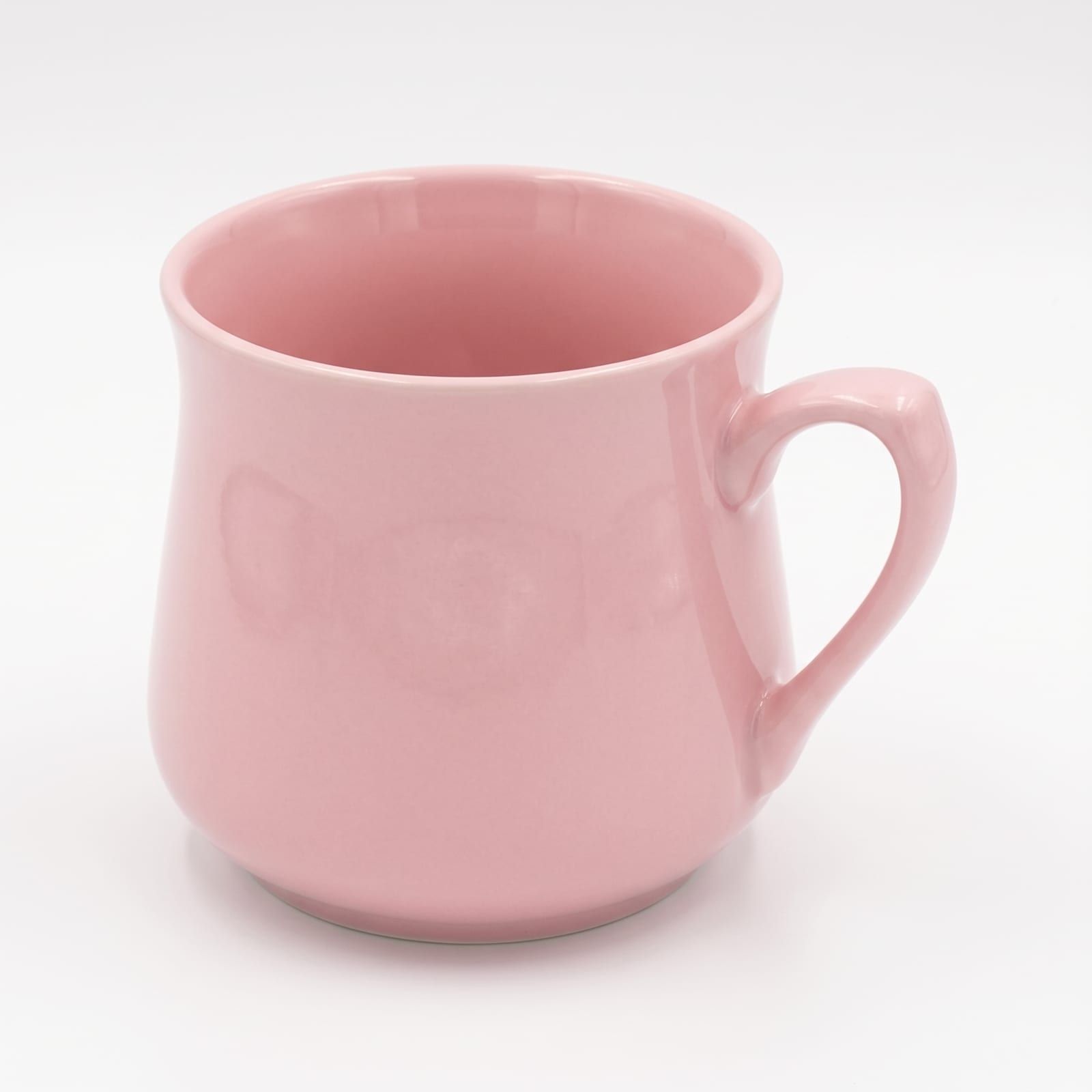 The pink mug as a packshot from a three-quarter angle, the handle to the right